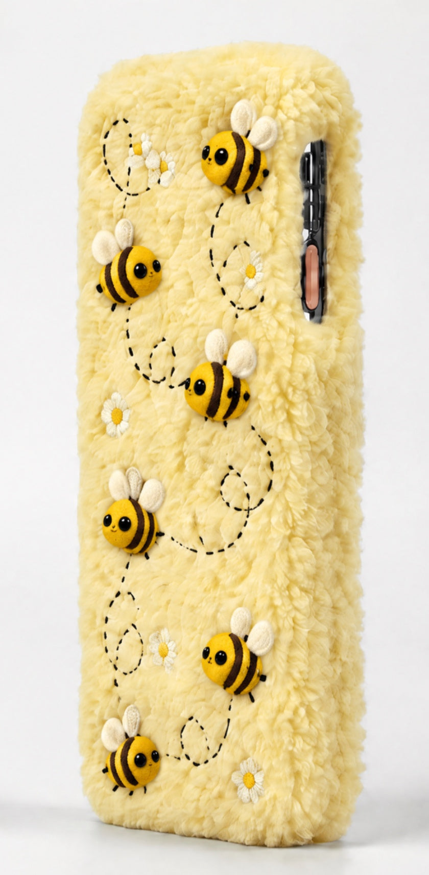 Yellow fluffy case with felt bees and daisies